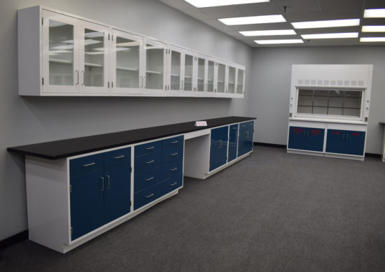 Blue laboratory cabinets will glass wall units.