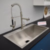 Blue laboratory cabinets with black epoxy work surface and sink.