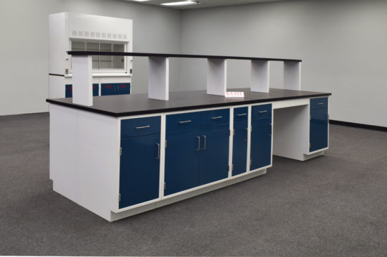 Laboratory island with desk area and center shelf.