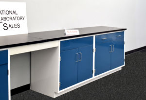 Laboratory cabinets with black countertop.
