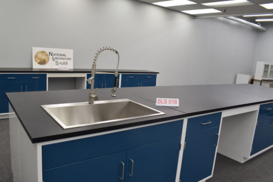 Laboratory cabinets with black countertop.