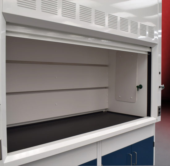 Fume hood and laboratory cabinet combination with two blue flammable storage cabinets.