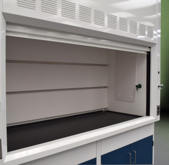 Fume hood and laboratory cabinet combination with two blue acid storage cabinets.