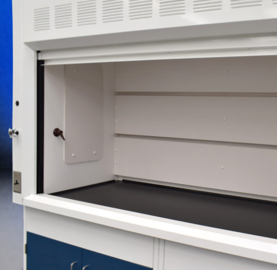 Fume hood and cabinet combination with blue flammable cabinets.