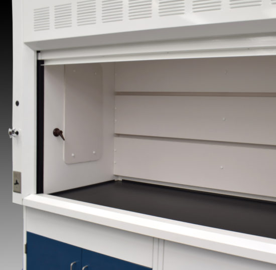 Fume hood and cabinet combination with blue cabinets.