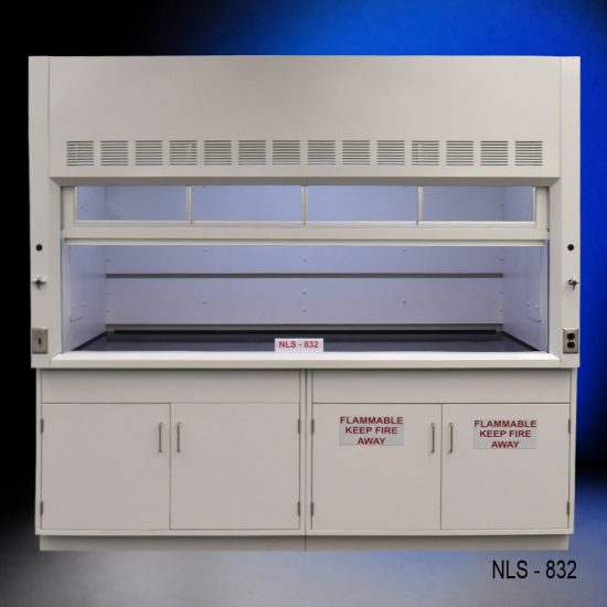 Laboratory fume hood, model NLS-832, manufactured by Fisher American. It features a spacious work area with a wide viewing sash for easy access and visibility. Above the chamber are ventilation slats for effective air exhaust. Below the work area, there is cabinetry with blue double-door compartments labeled "FLAMMABLE KEEP FIRE AWAY," designed for safe storage of flammable materials. The fume hood has a robust build and is situated against a blue background. The sash is partially open.