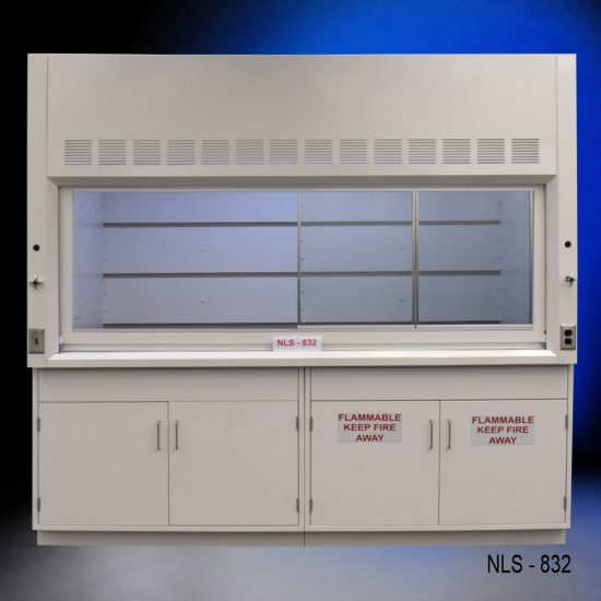 Laboratory fume hood, model NLS-832, manufactured by Fisher American. It features a work area with a wide viewing sash for easy access and visibility. Above the chamber are ventilation slats for effective air exhaust. Below the work area, there is cabinetry with blue double-door compartments labeled "FLAMMABLE KEEP FIRE AWAY," designed for safe storage of flammable materials. The fume hood has a robust build.