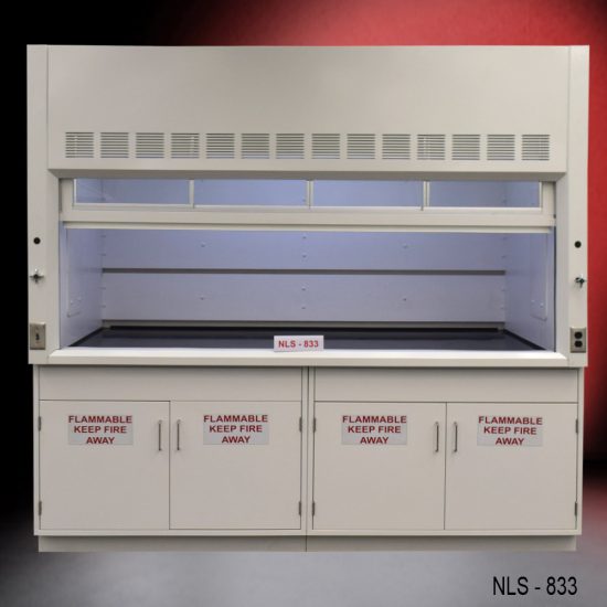 Laboratory fume hood, model NLS-833, manufactured by Fisher American. It features a spacious work area with a wide viewing sash for easy access and visibility. Above the chamber are ventilation slats for effective air exhaust. Below the work area, there is cabinetry with double-door compartments labeled "FLAMMABLE KEEP FIRE AWAY," designed for safe storage of flammable materials.
