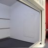 Inside right corner 8′ Fisher American Fume Hood w/ Flammable & General Storage