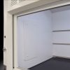 Inside left corner 8′ Fisher American Fume Hood w/ Flammable & General Storage