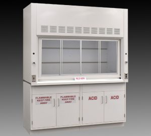 Fisher American laboratory fume hood workstation with four base storage cabinets labeled for flammable and acid storage. The two left cabinets are marked 'FLAMMABLE KEEP FIRE AWAY' in red text, and the two right cabinets are labeled 'ACID.'
